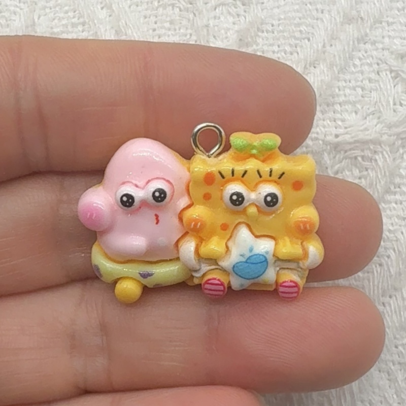 Pendentif en résine de dessin  - Party Games Questions avis et prix